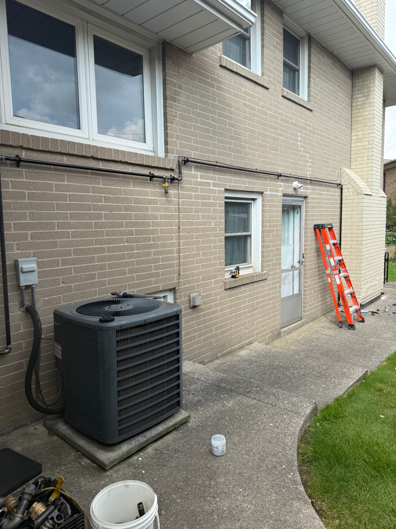Licensed technician installing natural gas BBQ line in Wasaga Beach
